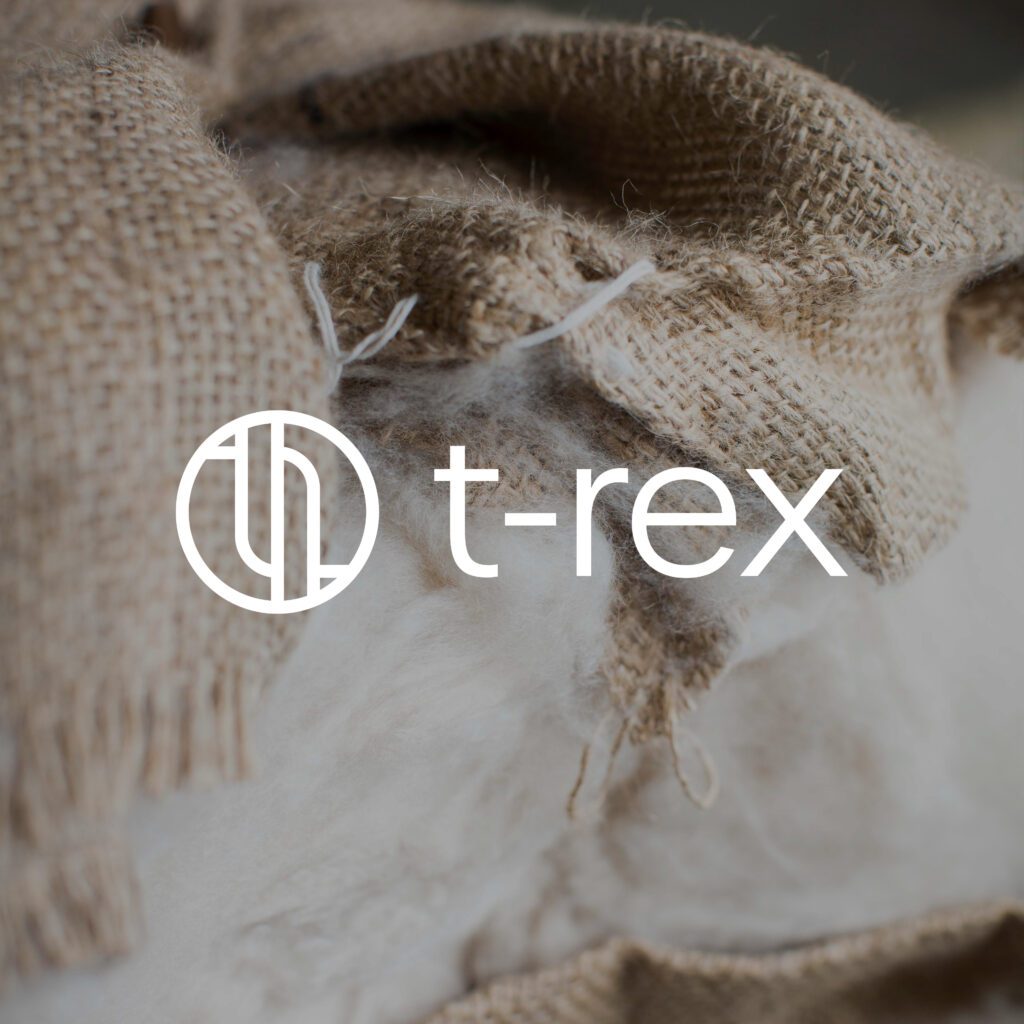 organic cotton in a tweed bag with t-rex logo on top
